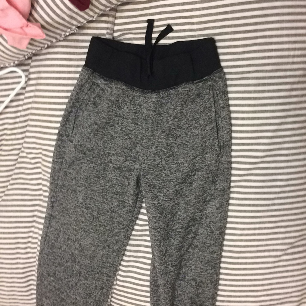 Soft has a gray sweatpants